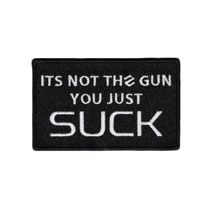 "IT'S NOT THE GUN YOU JUST SUCK" PATCH